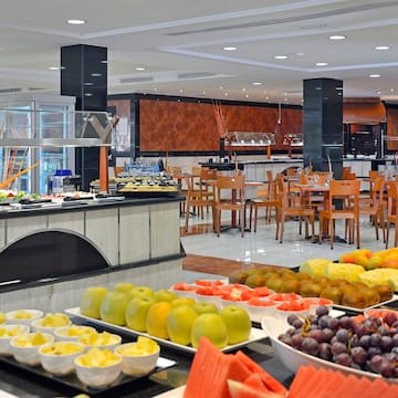 a buffet with fruit on the counter