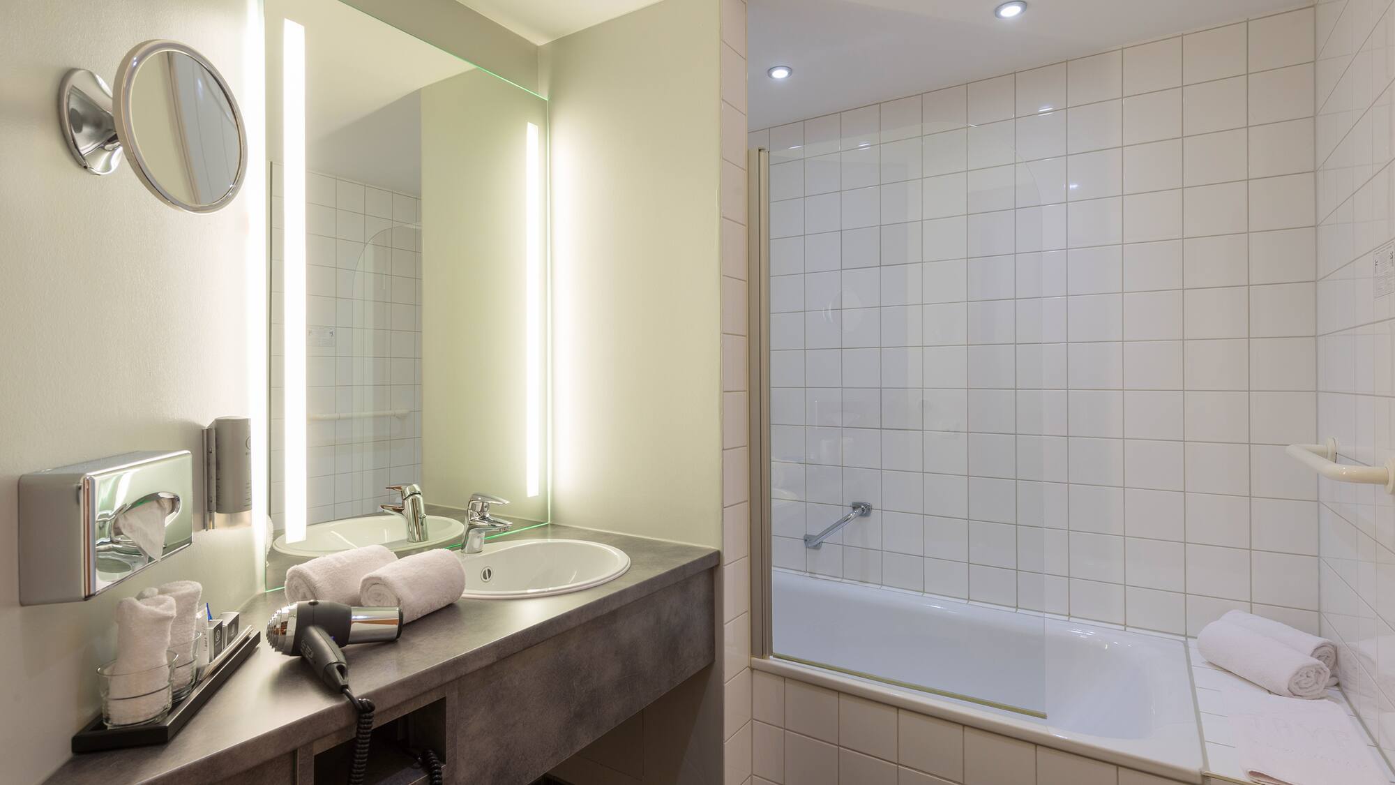 a bathroom with a sink and a bathtub