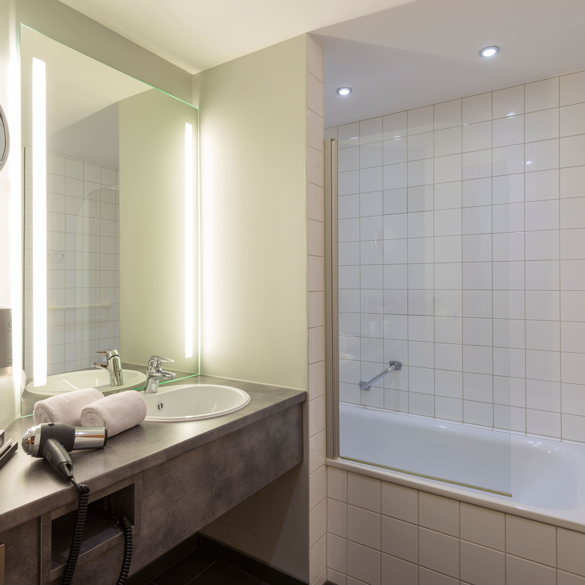 a bathroom with a sink and a bathtub