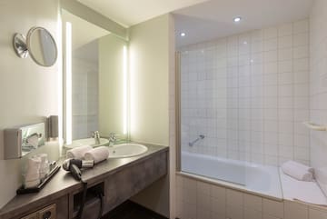 a bathroom with a sink and a bathtub