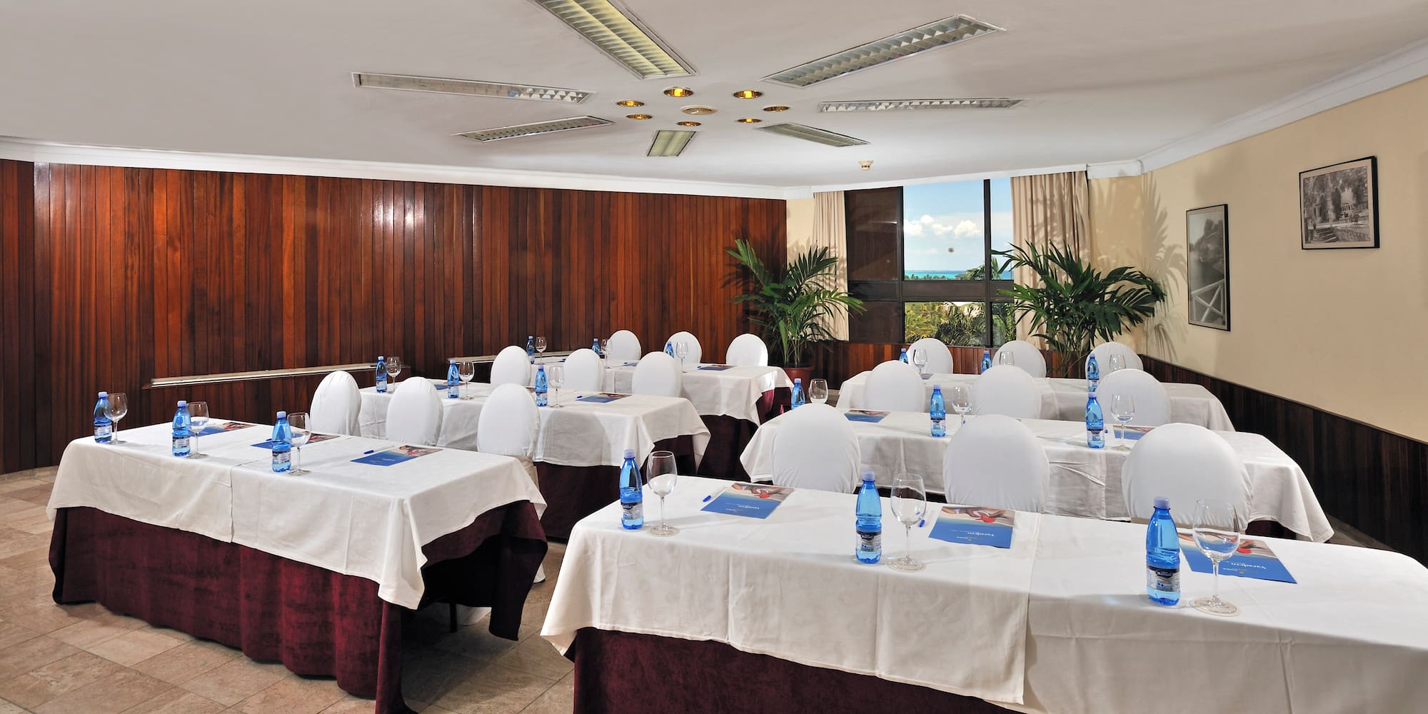 a room with tables and chairs
