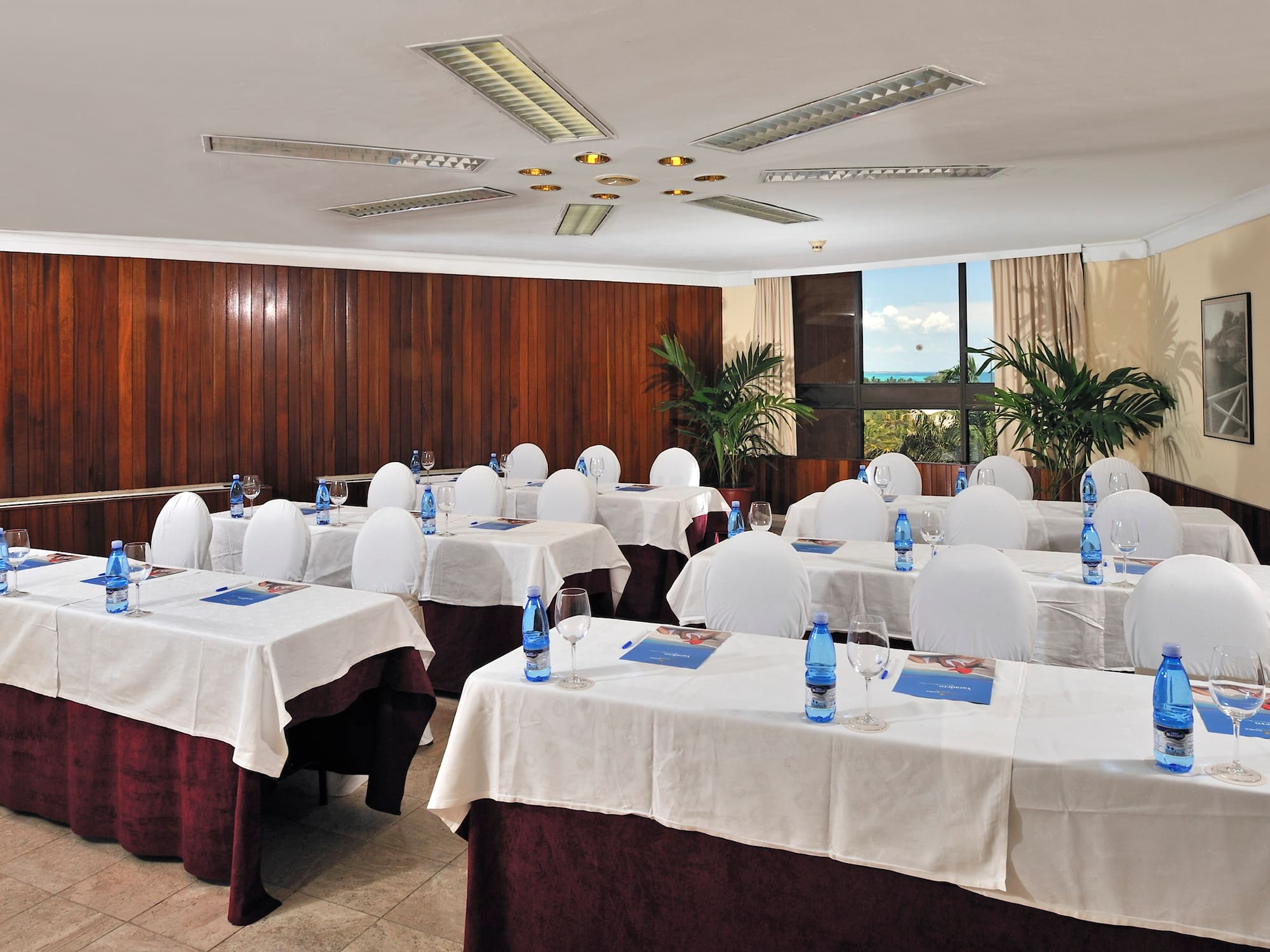 a room with tables and chairs