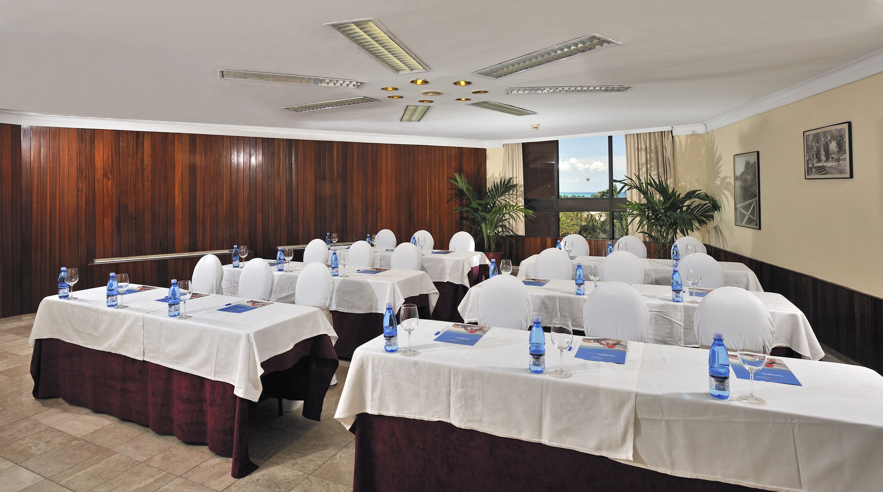 a room with tables and chairs