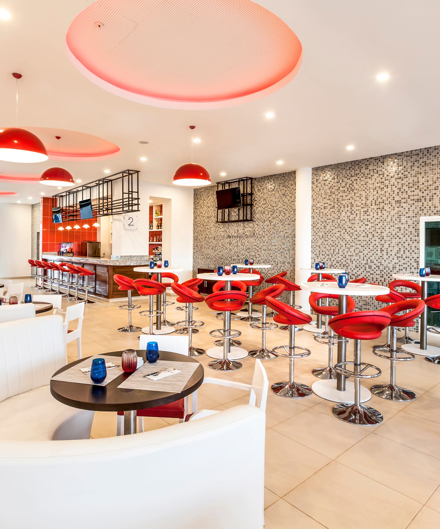 a room with tables and chairs