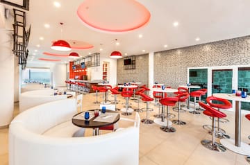 a room with tables and chairs