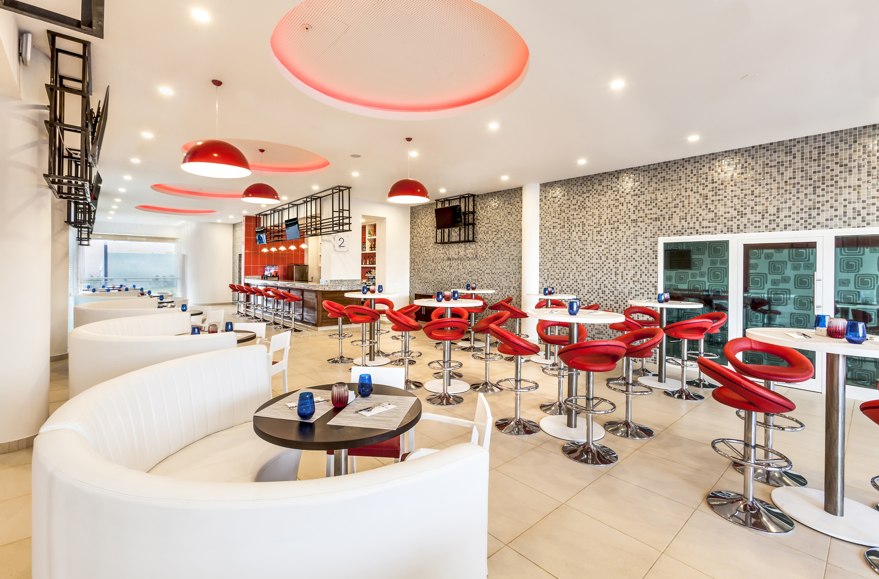 a room with tables and chairs