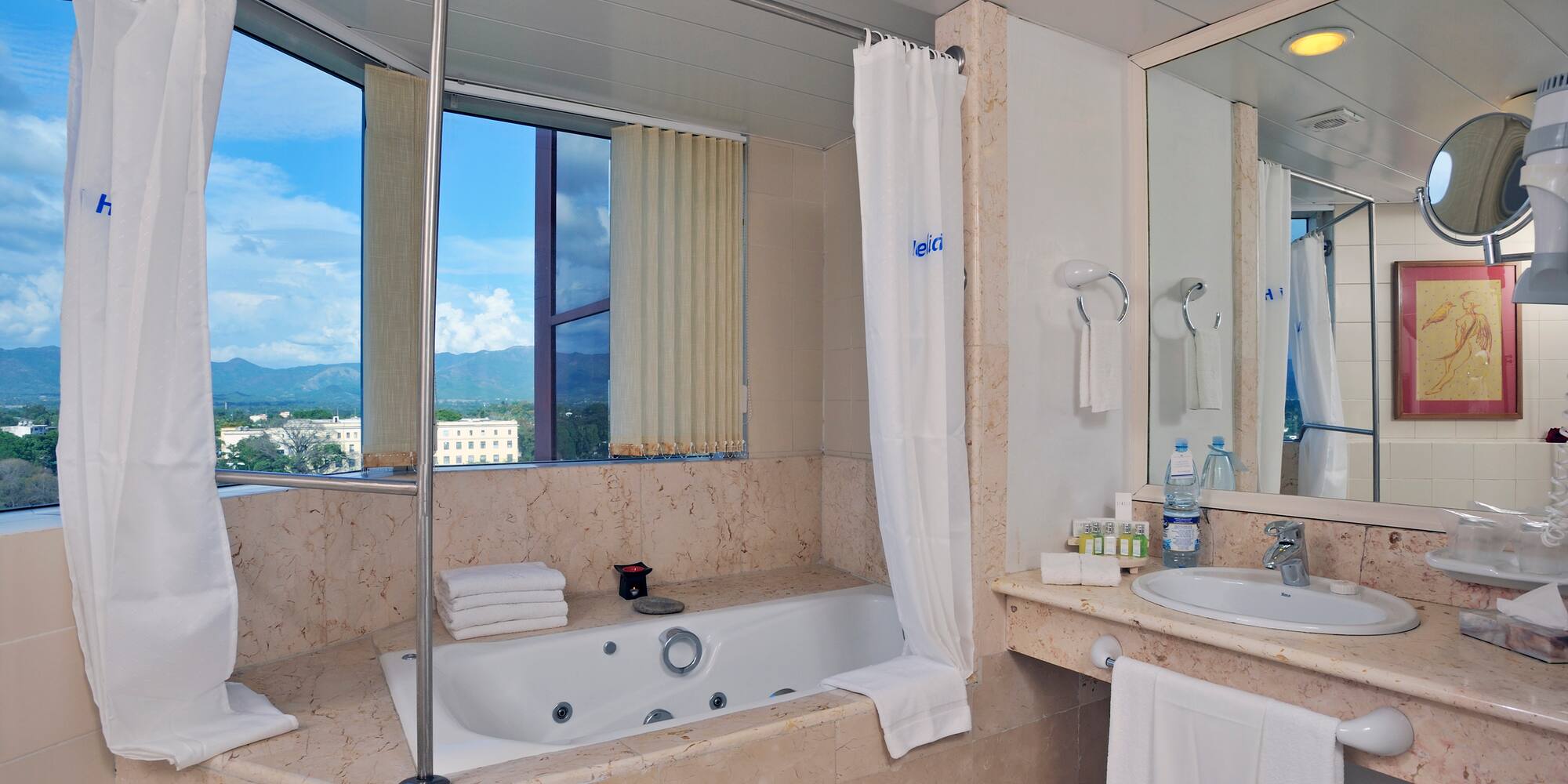 a bathroom with a tub and sink