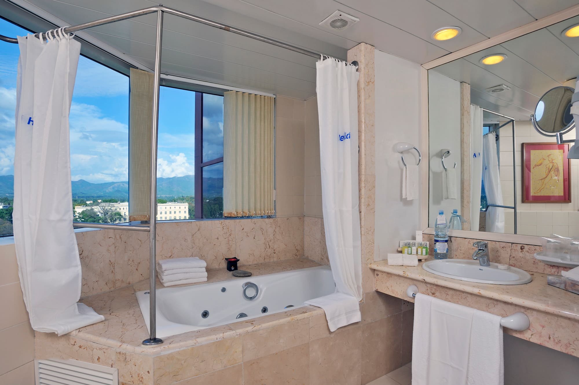 a bathroom with a tub and sink