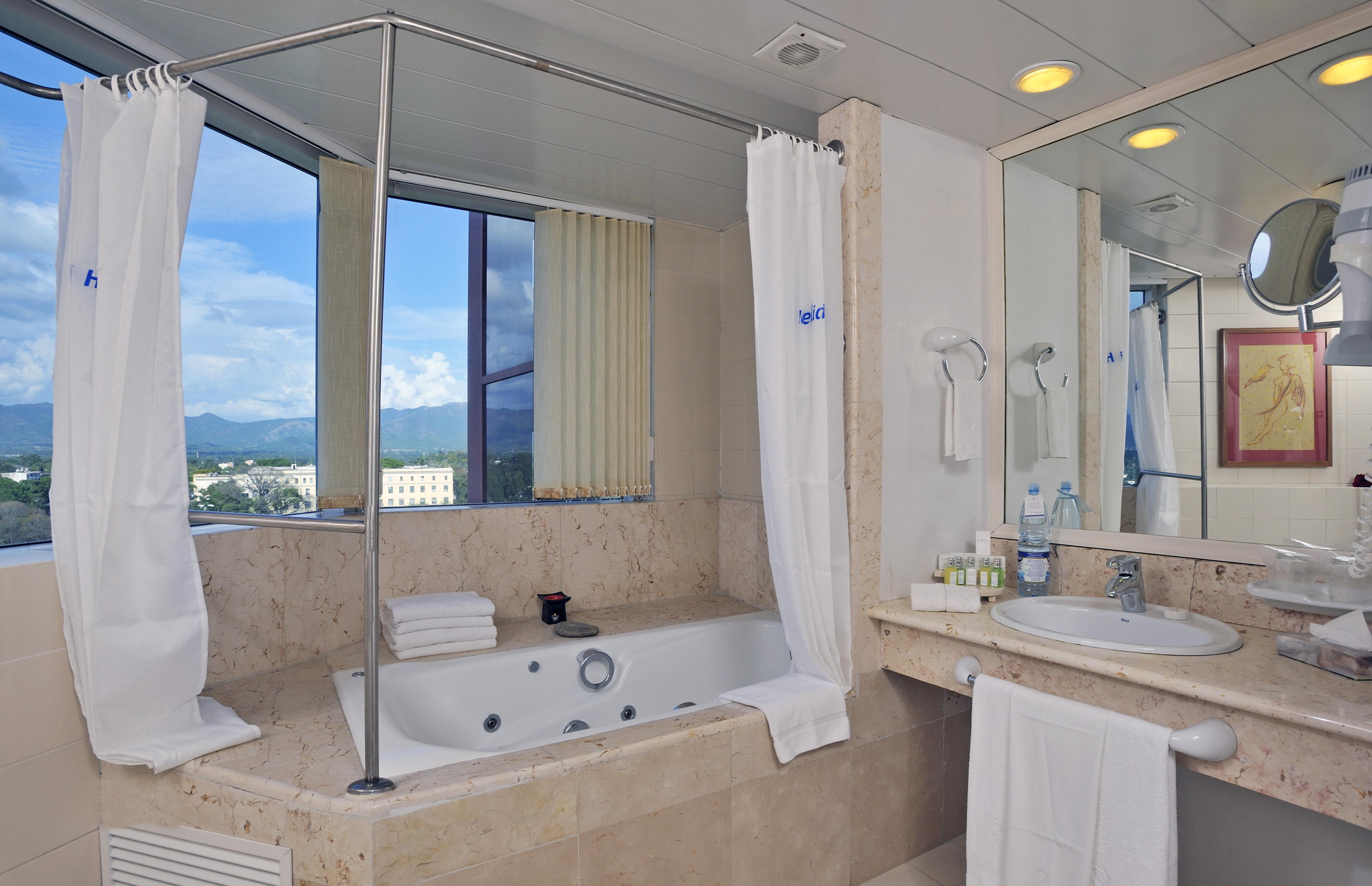 a bathroom with a tub and sink