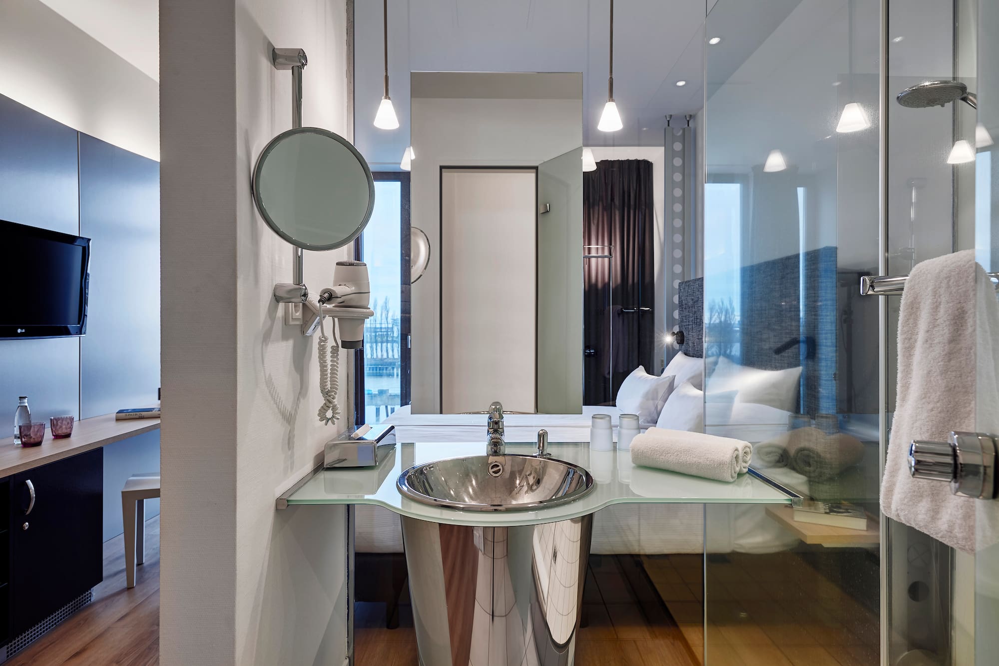 a bathroom with a mirror and sink