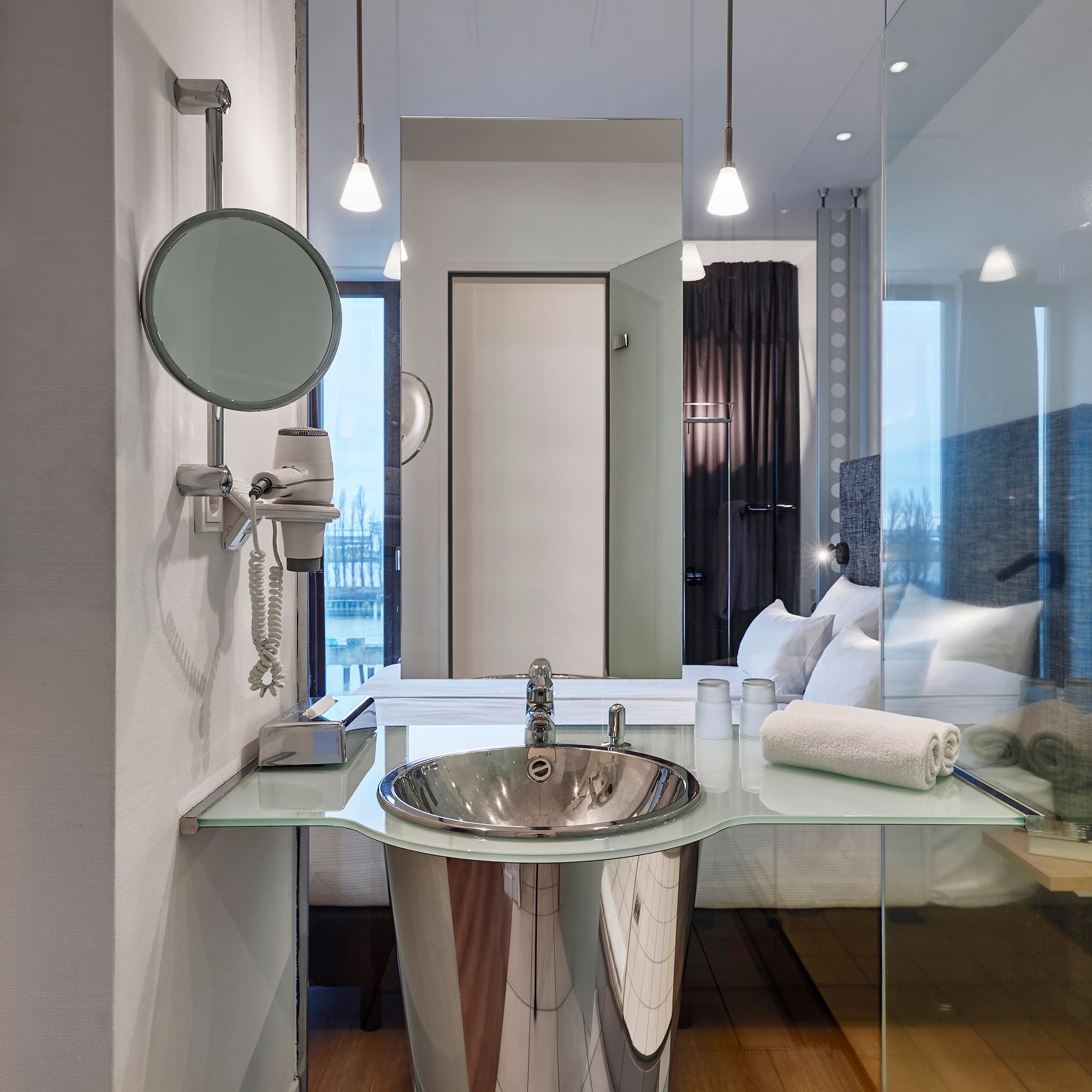 a bathroom with a mirror and sink