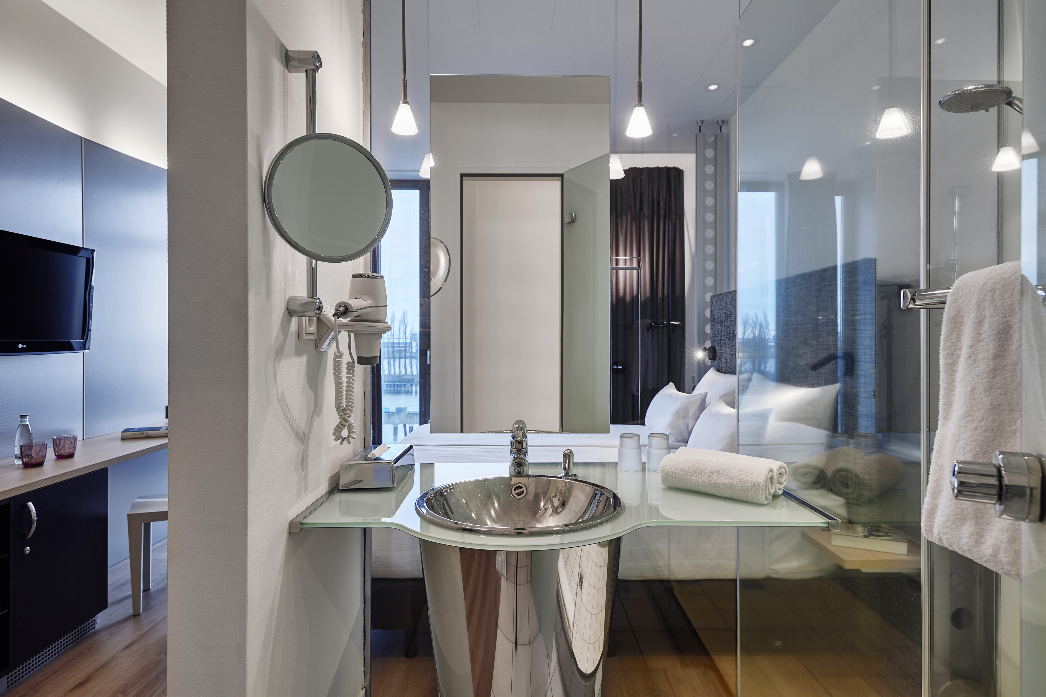 a bathroom with a mirror and sink