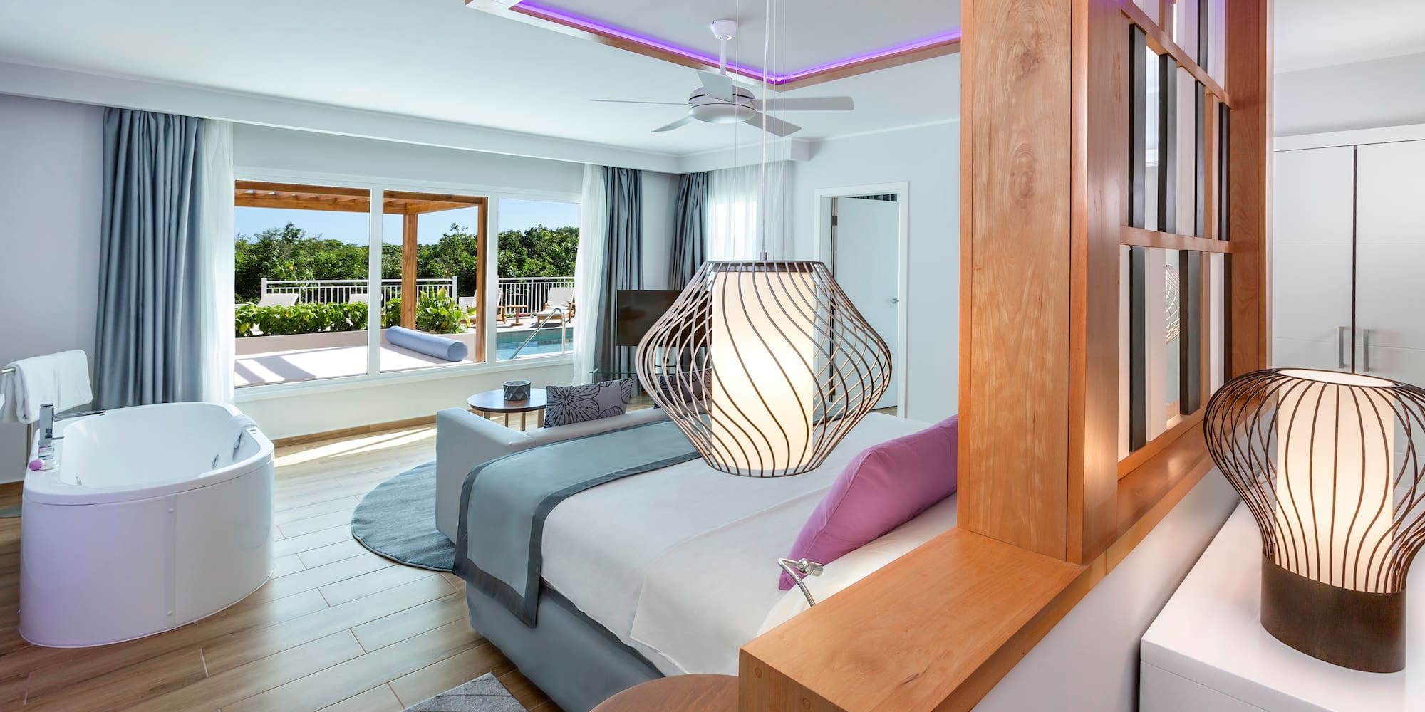 a room with a bed and a tub