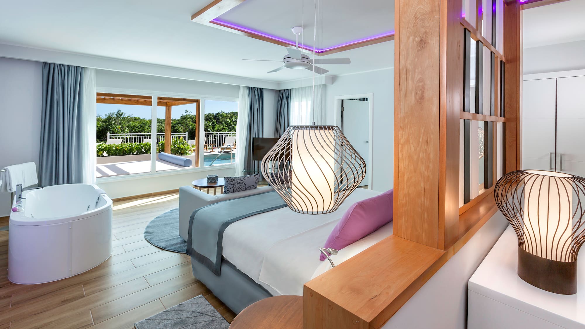 a room with a bed and a tub