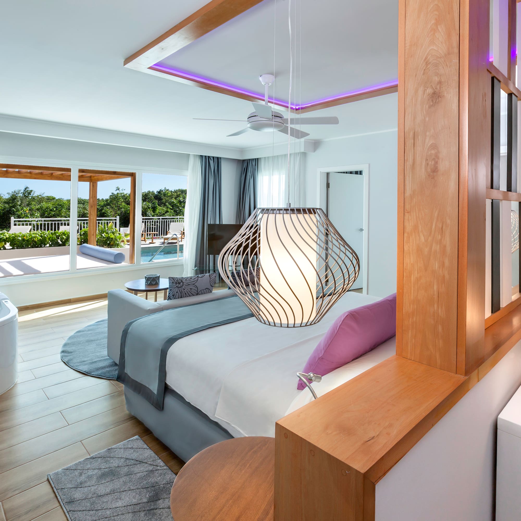 a room with a bed and a tub