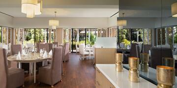 a room with tables and chairs