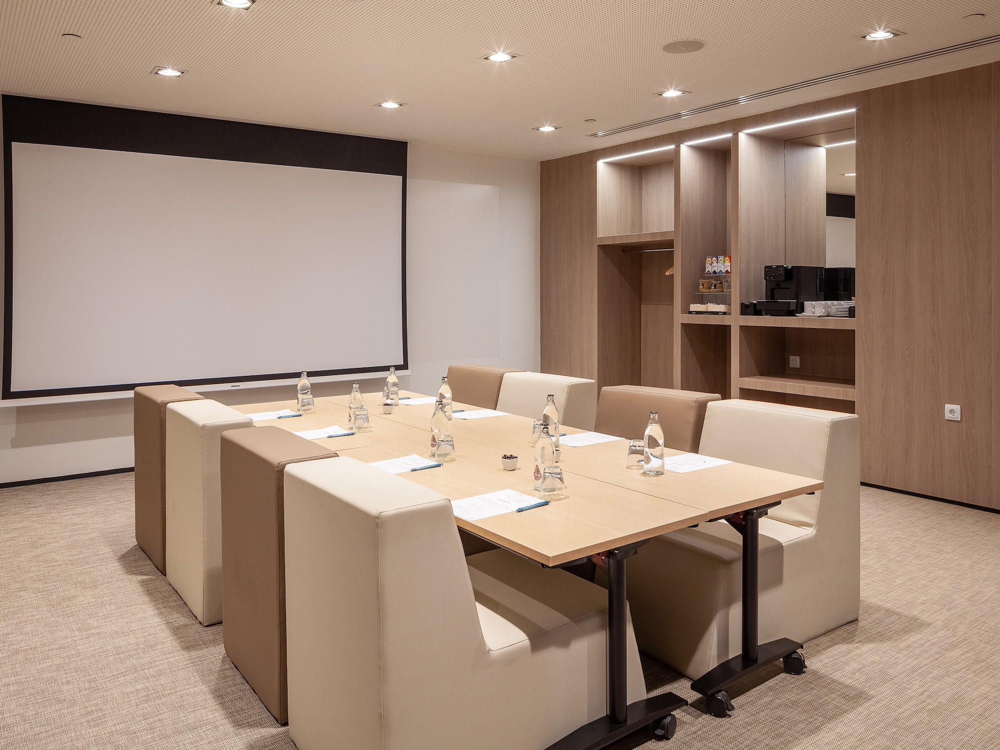 a room with a table and chairs