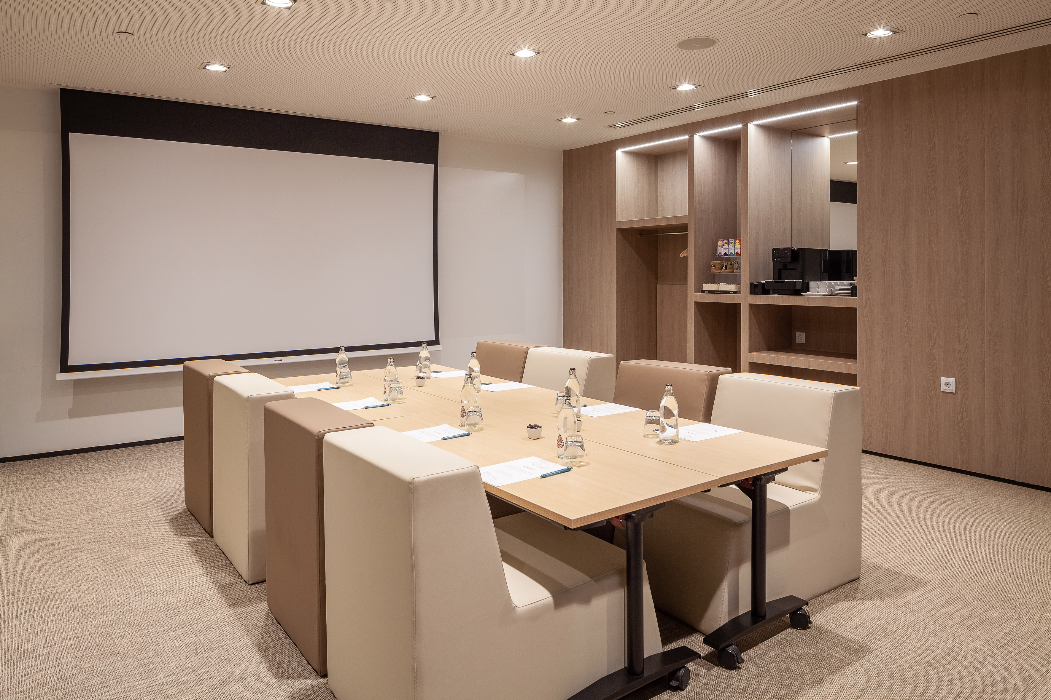 a room with a table and chairs