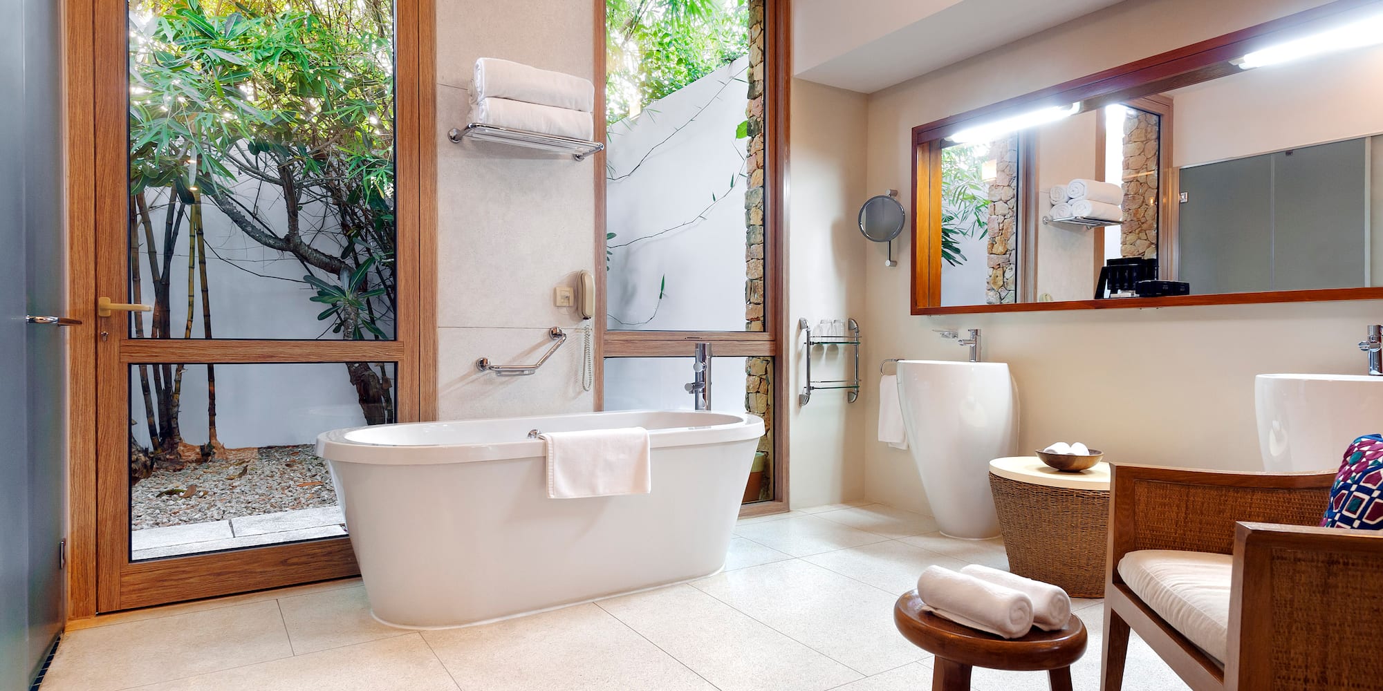 a bathroom with a tub and a toilet
