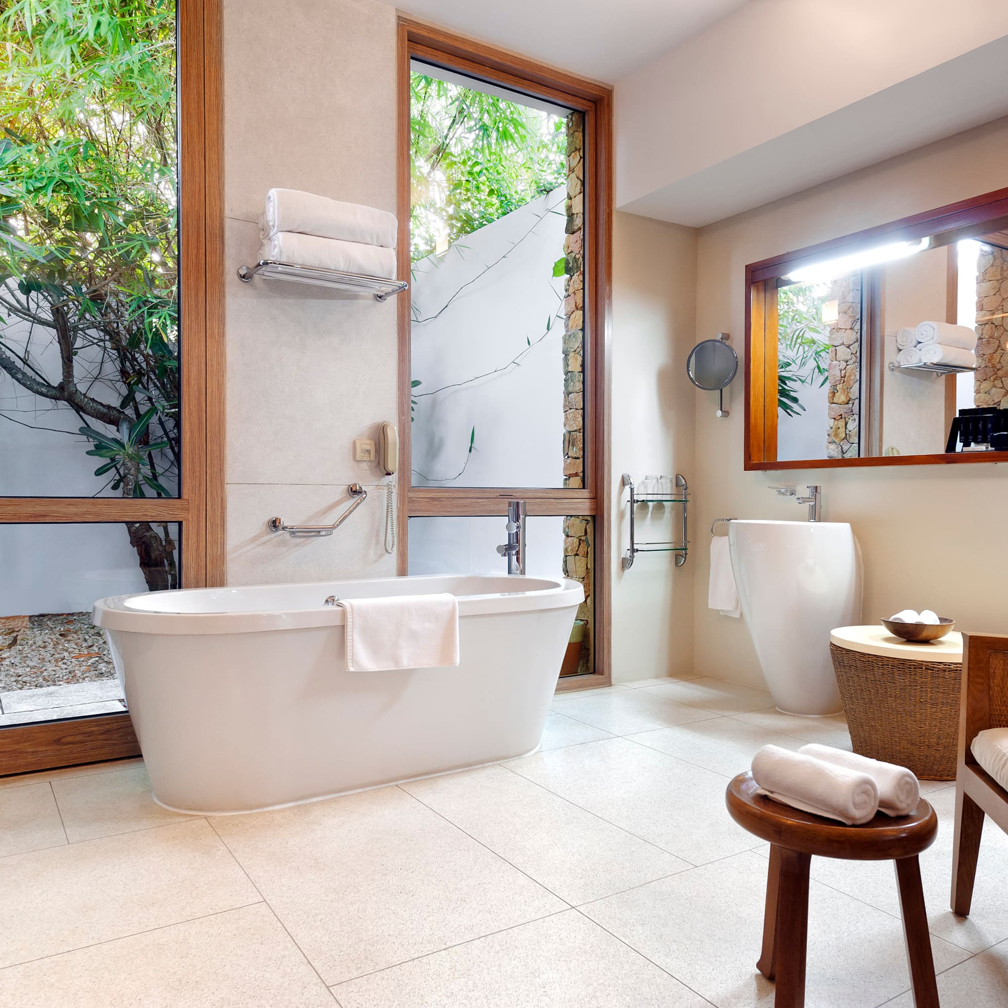 a bathroom with a tub and a toilet