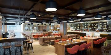 a restaurant with tables and chairs