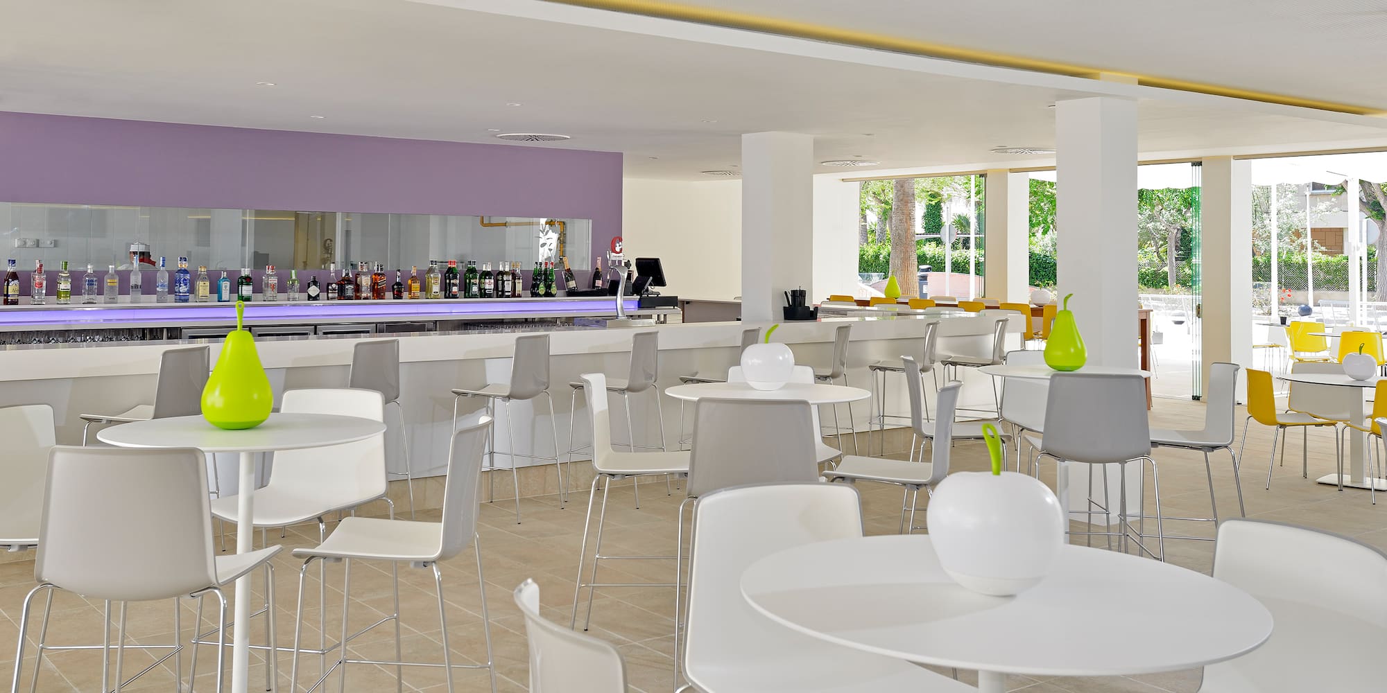 a room with tables and chairs