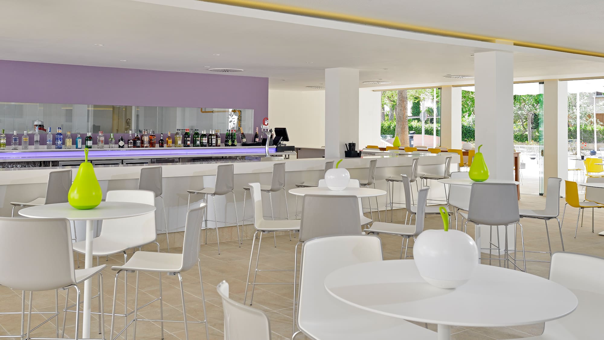 a room with tables and chairs