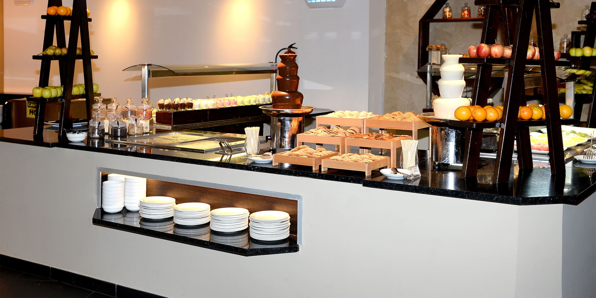 a buffet with food on the counter
