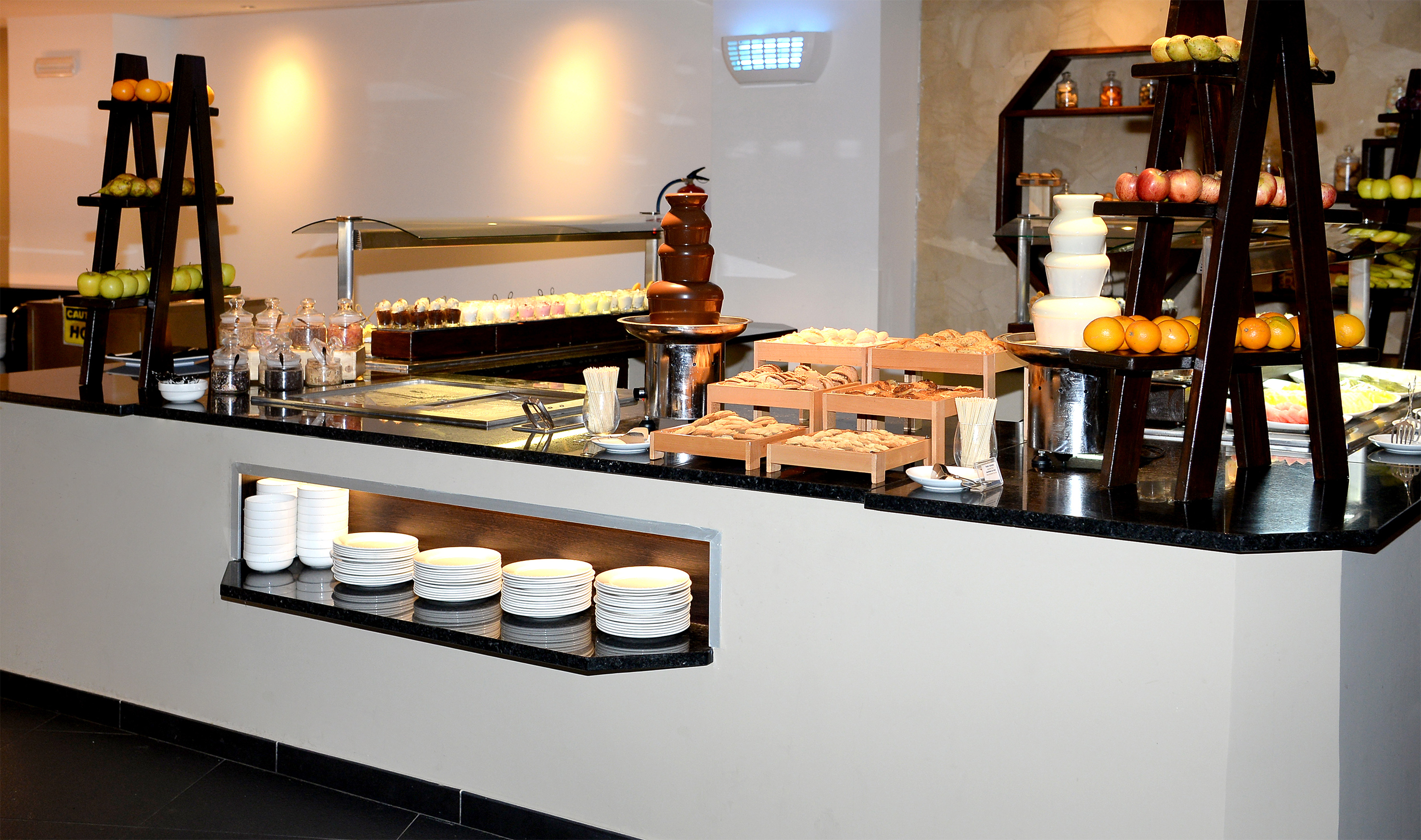 a buffet with food on the counter