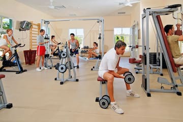a group of people working out in a gym