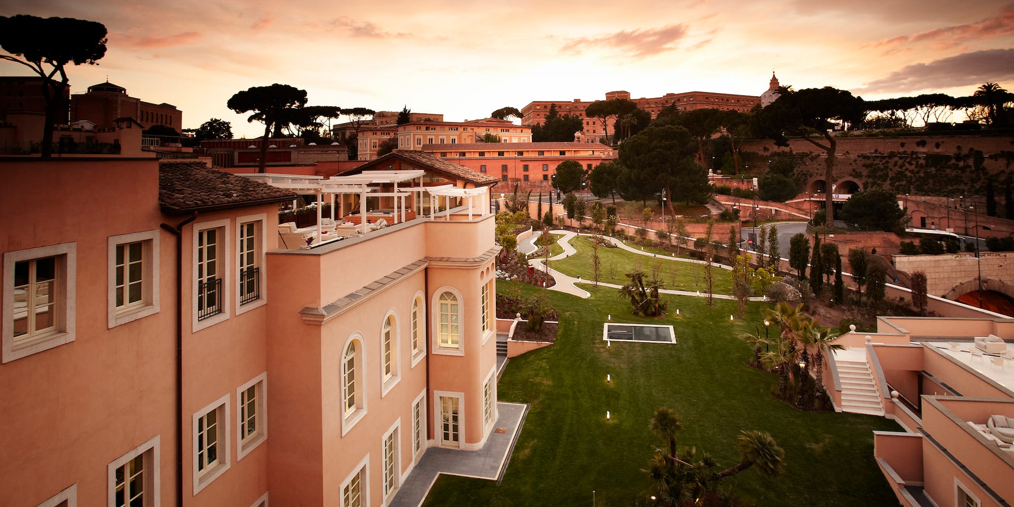 a building with a lawn and a fountain