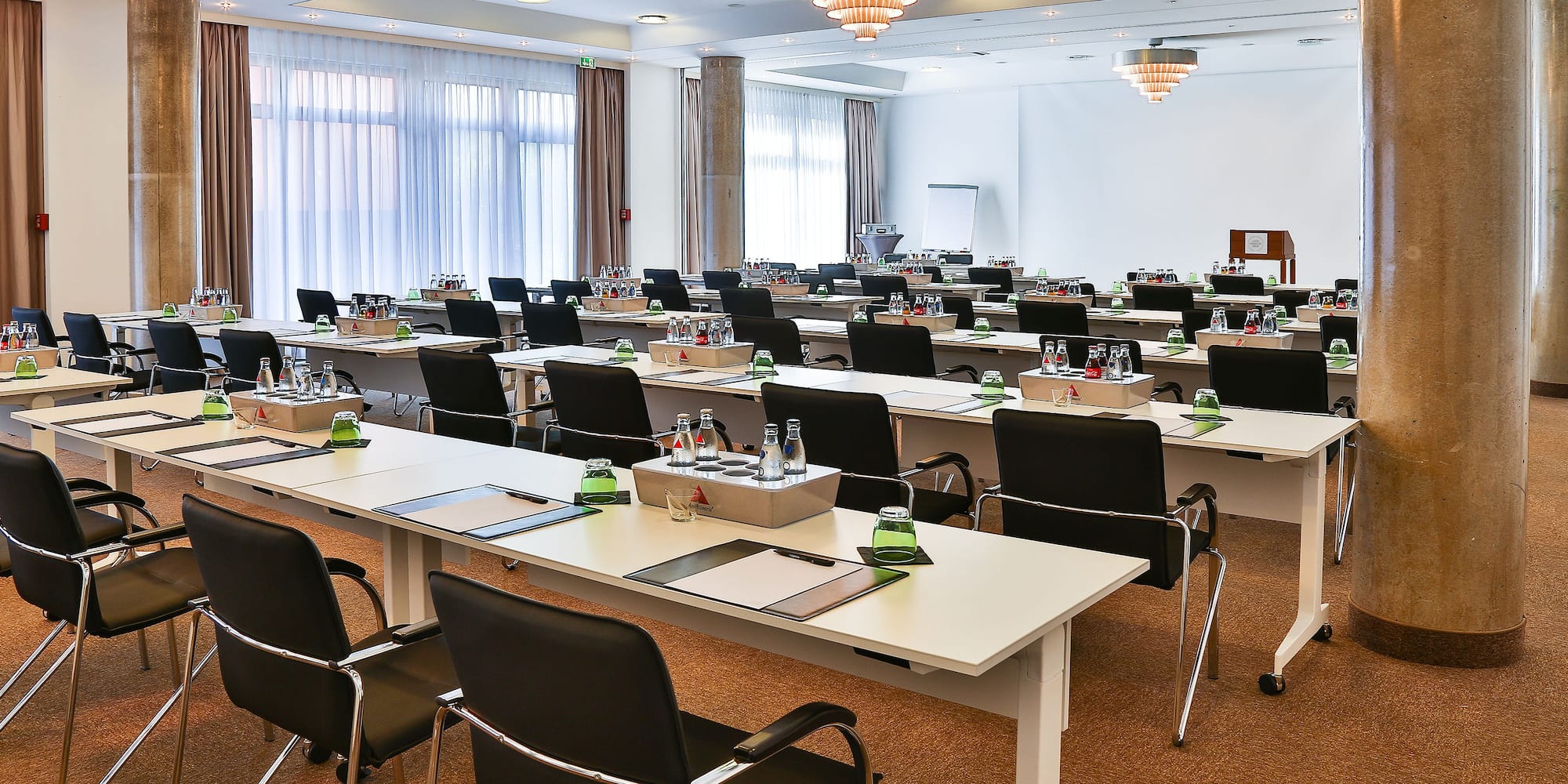a room with tables and chairs