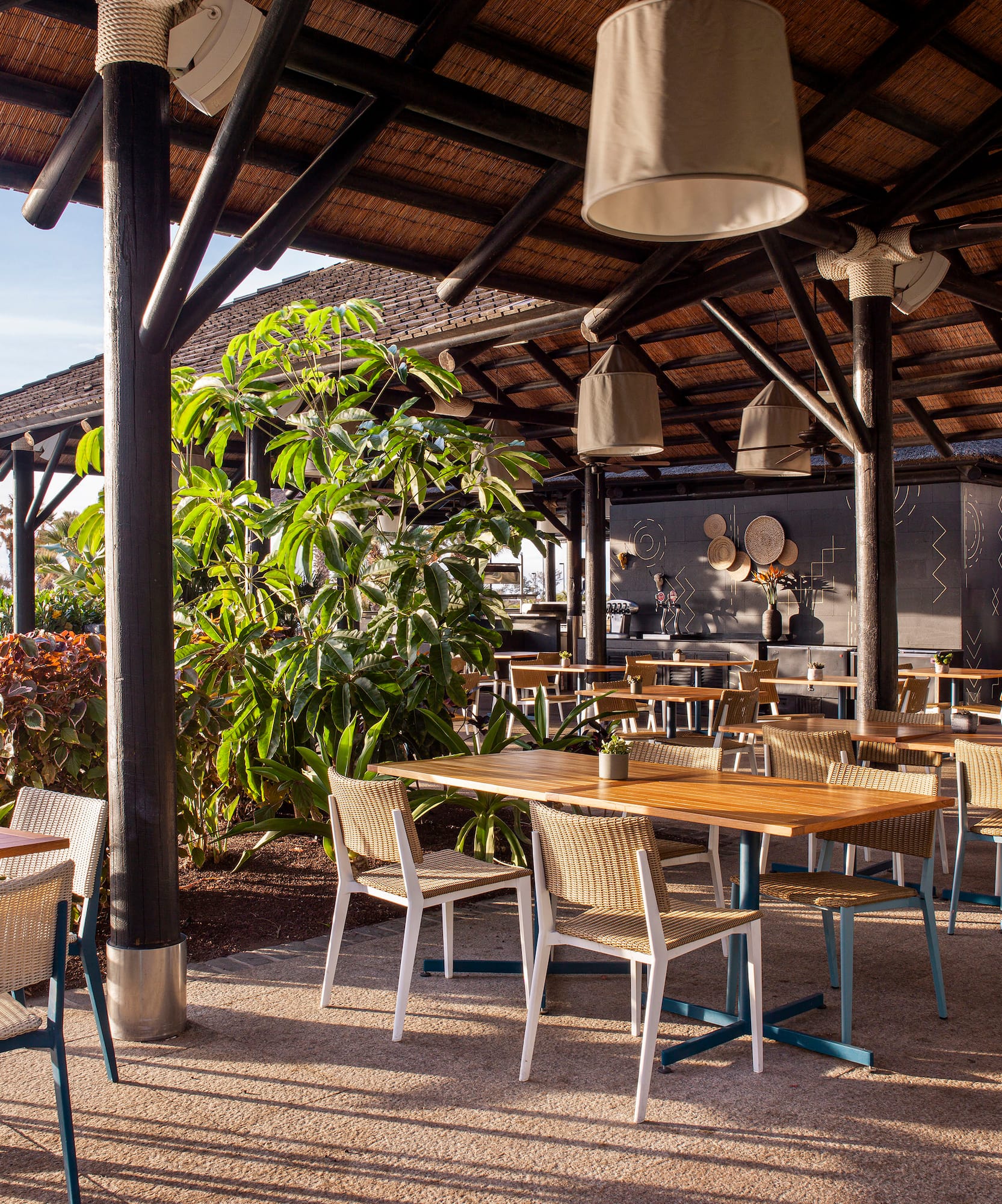 a restaurant with tables and chairs