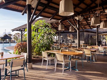 a restaurant with tables and chairs