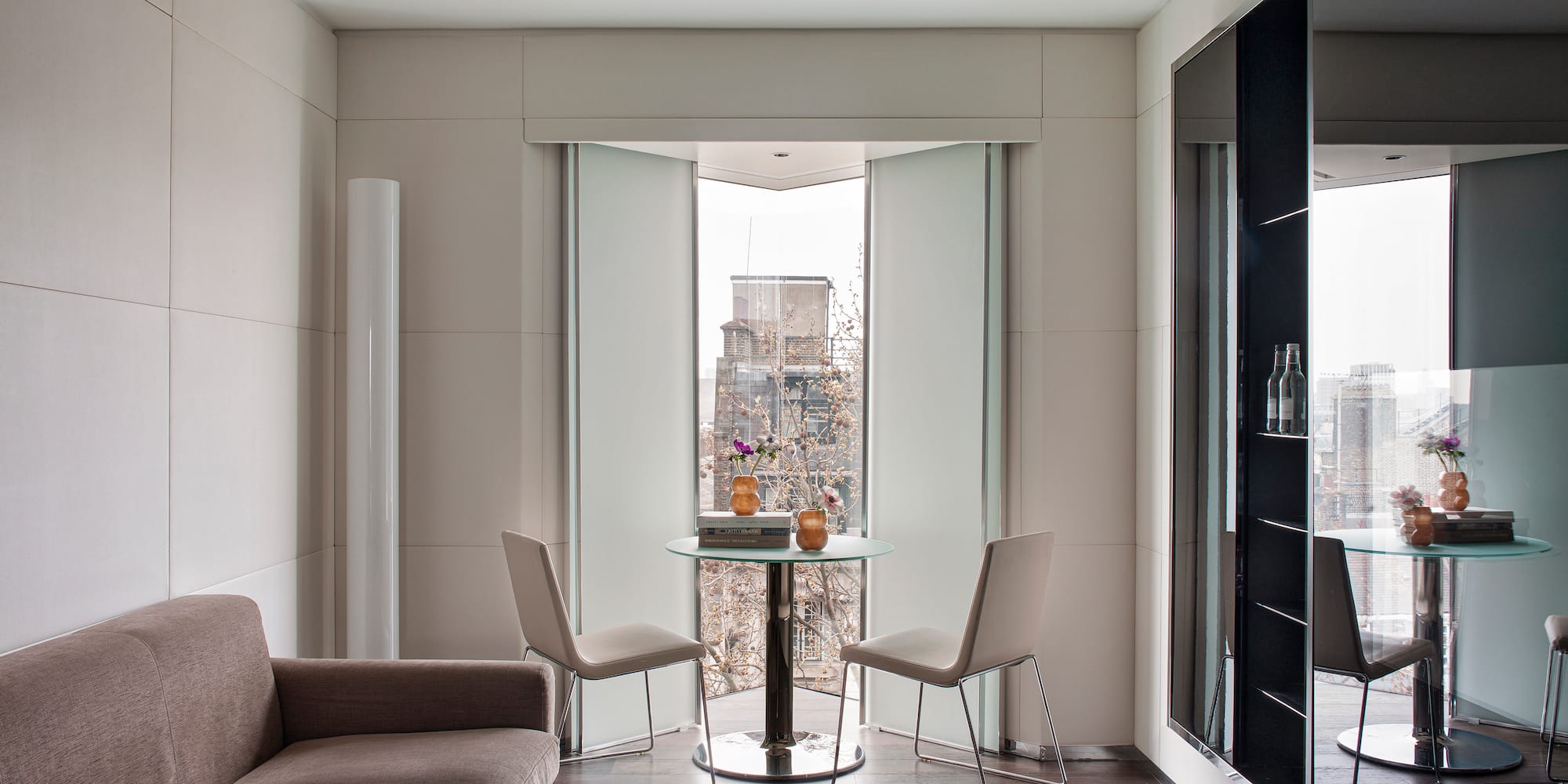 a living room with a couch and a table