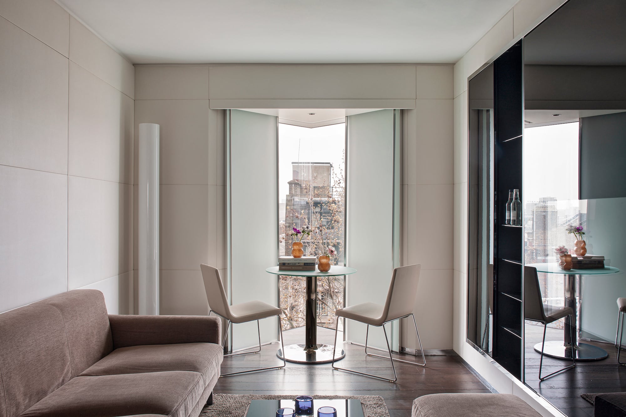 a living room with a couch and a table