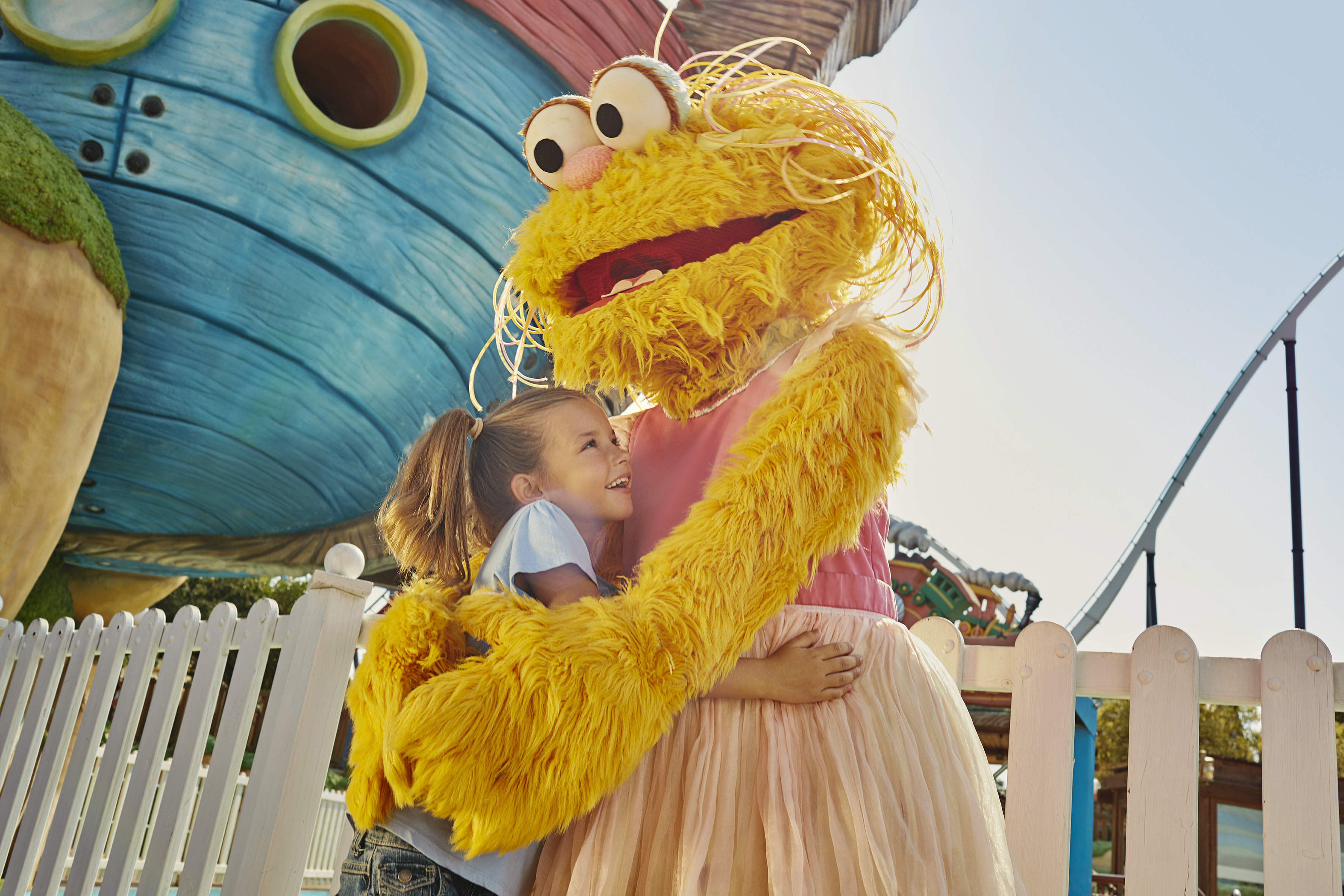 a girl hugging a person in a garment