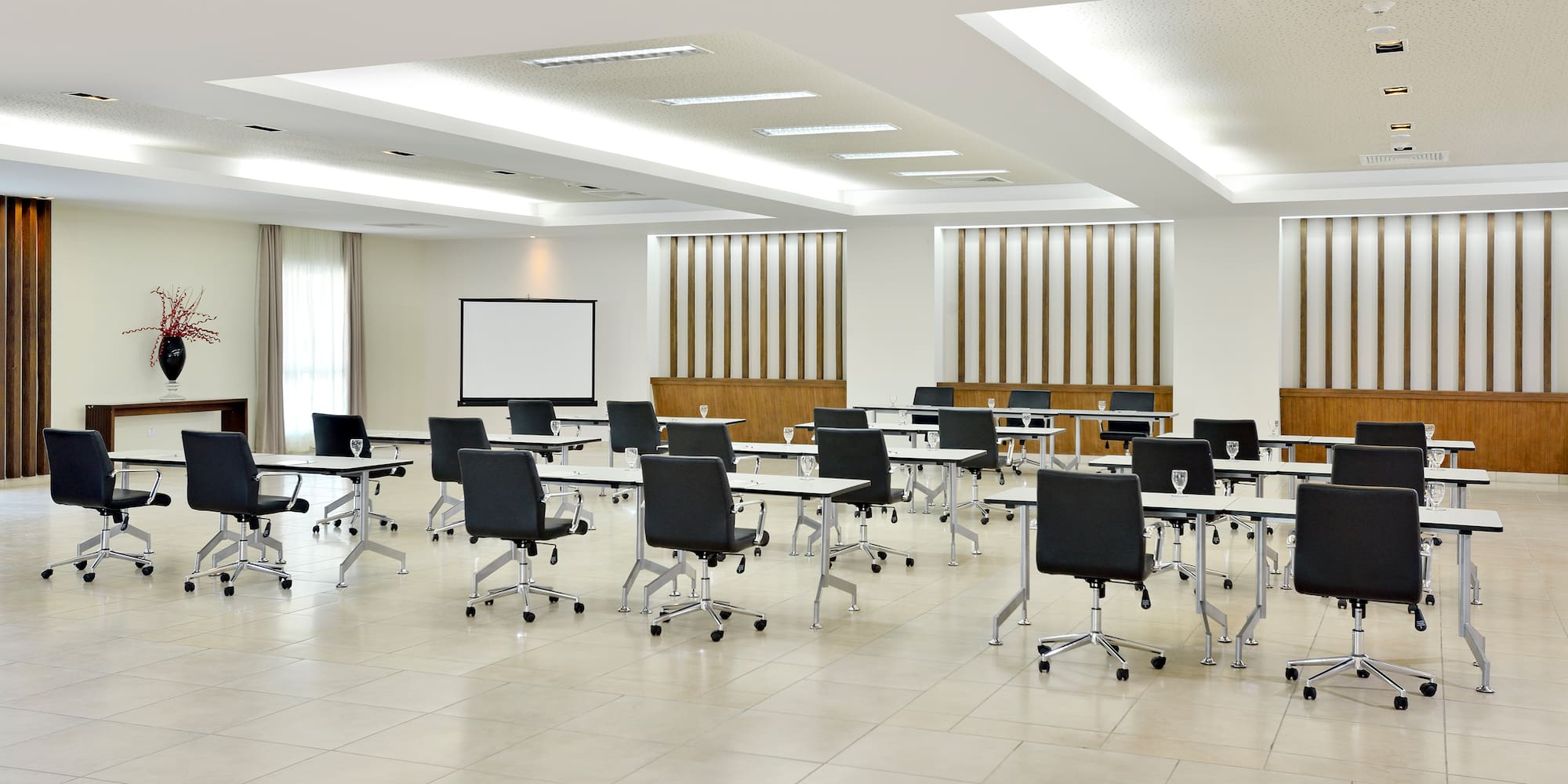 a room with tables and chairs