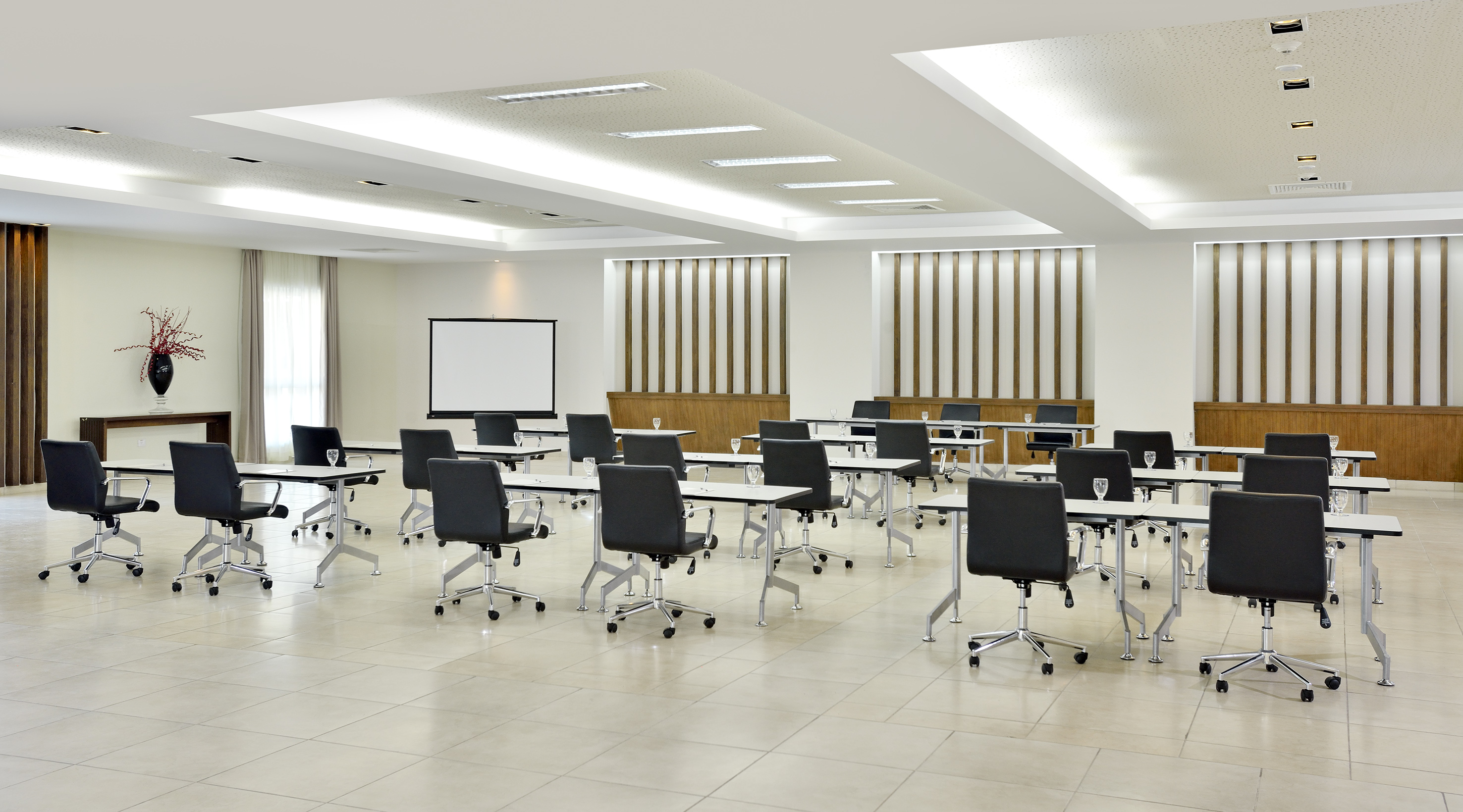 a room with tables and chairs