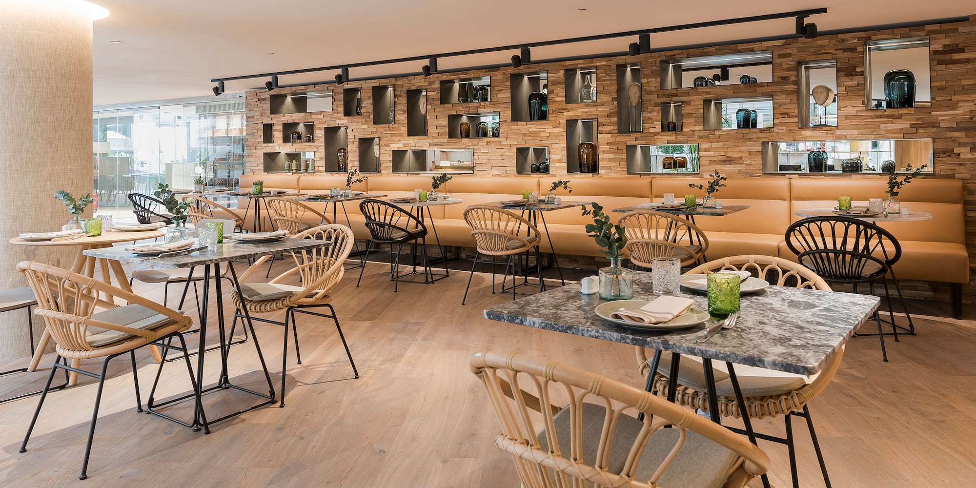 a restaurant with tables and chairs