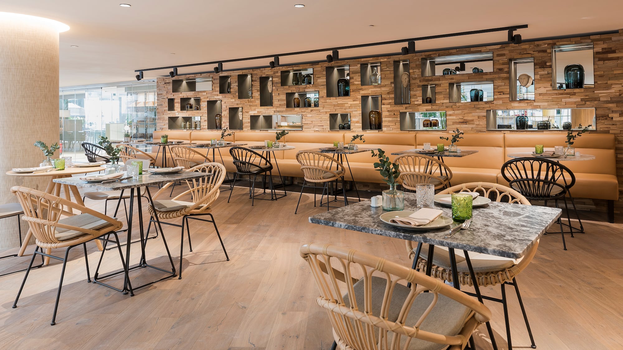 a restaurant with tables and chairs