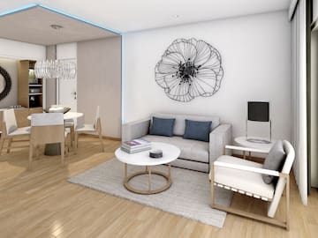 a living room with a couch and a table