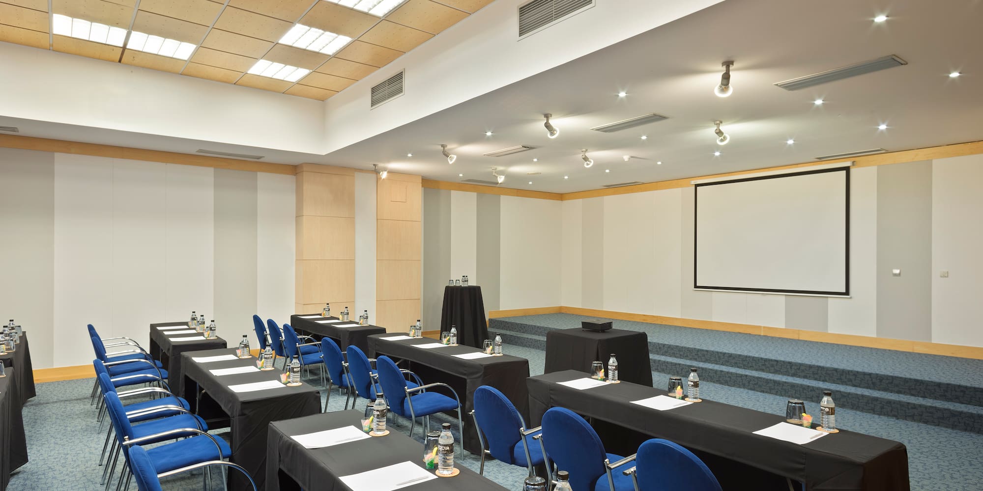 a room with tables and chairs