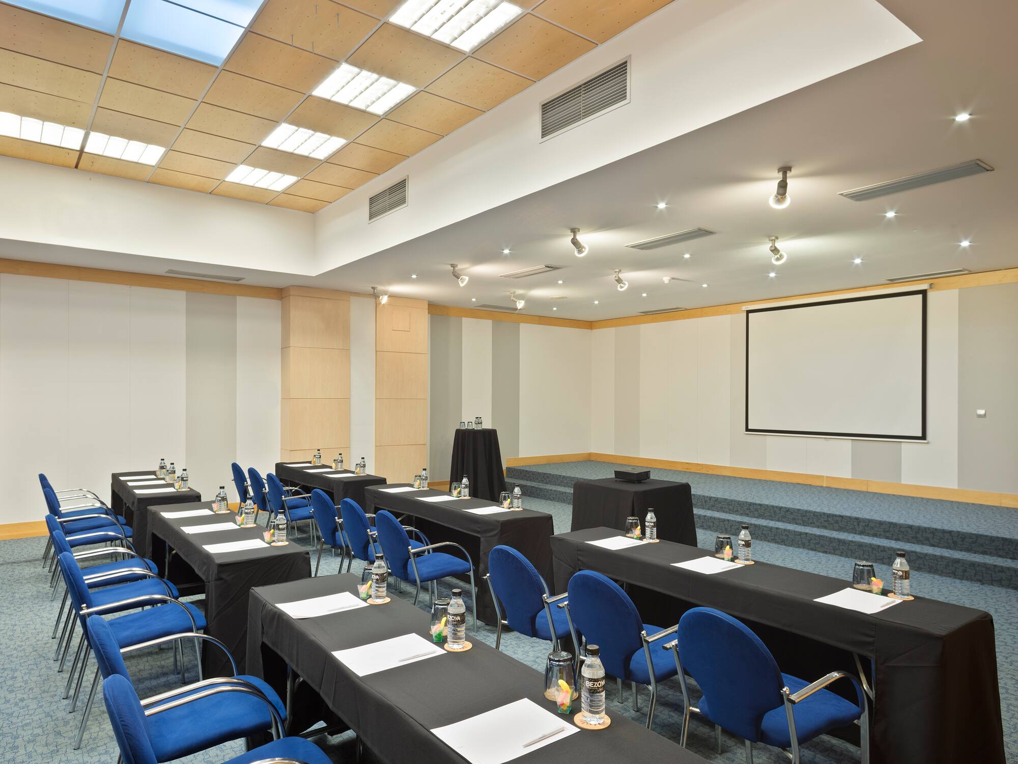 a room with tables and chairs