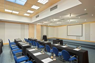 a room with tables and chairs