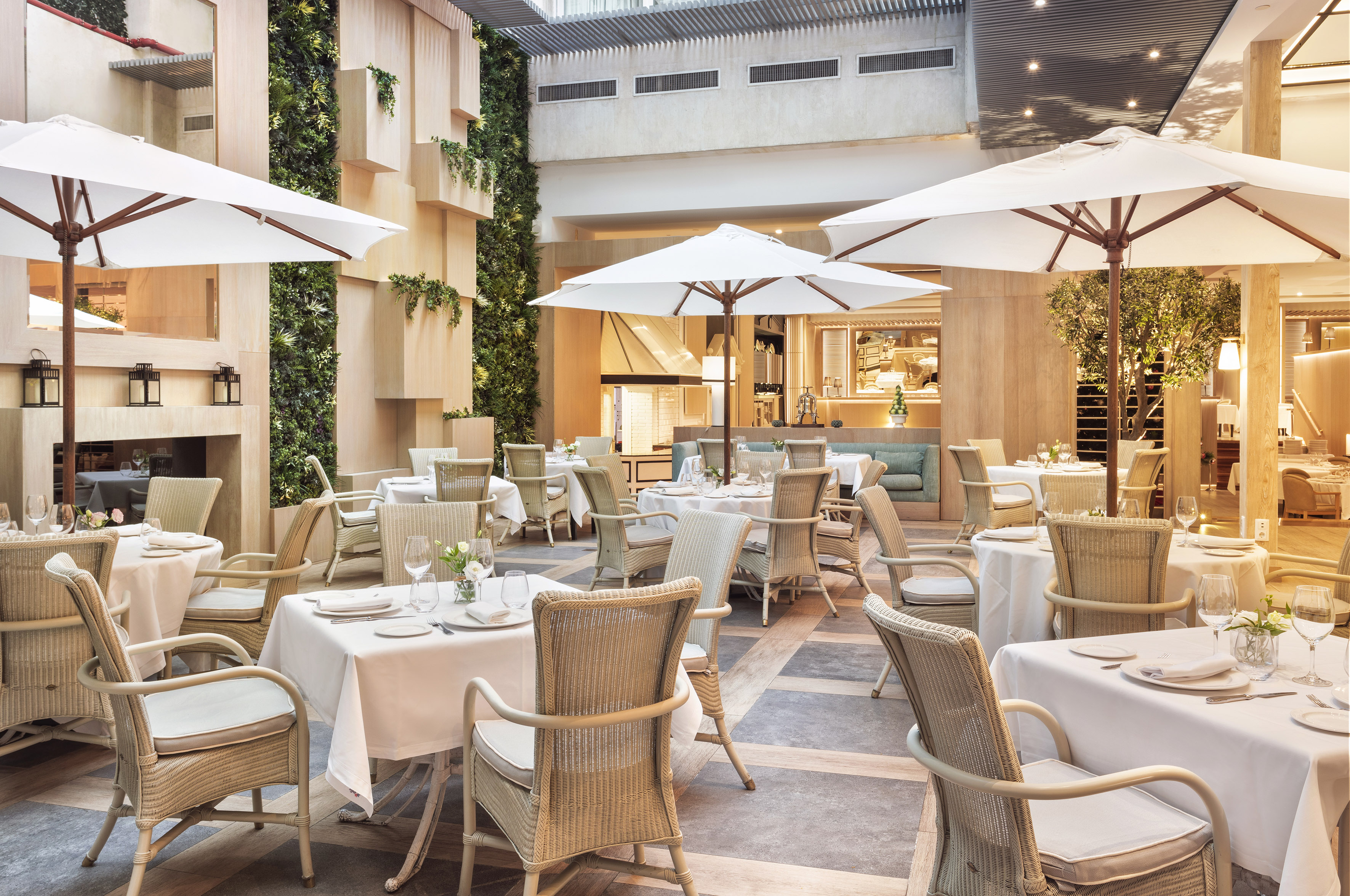 a restaurant with tables and chairs