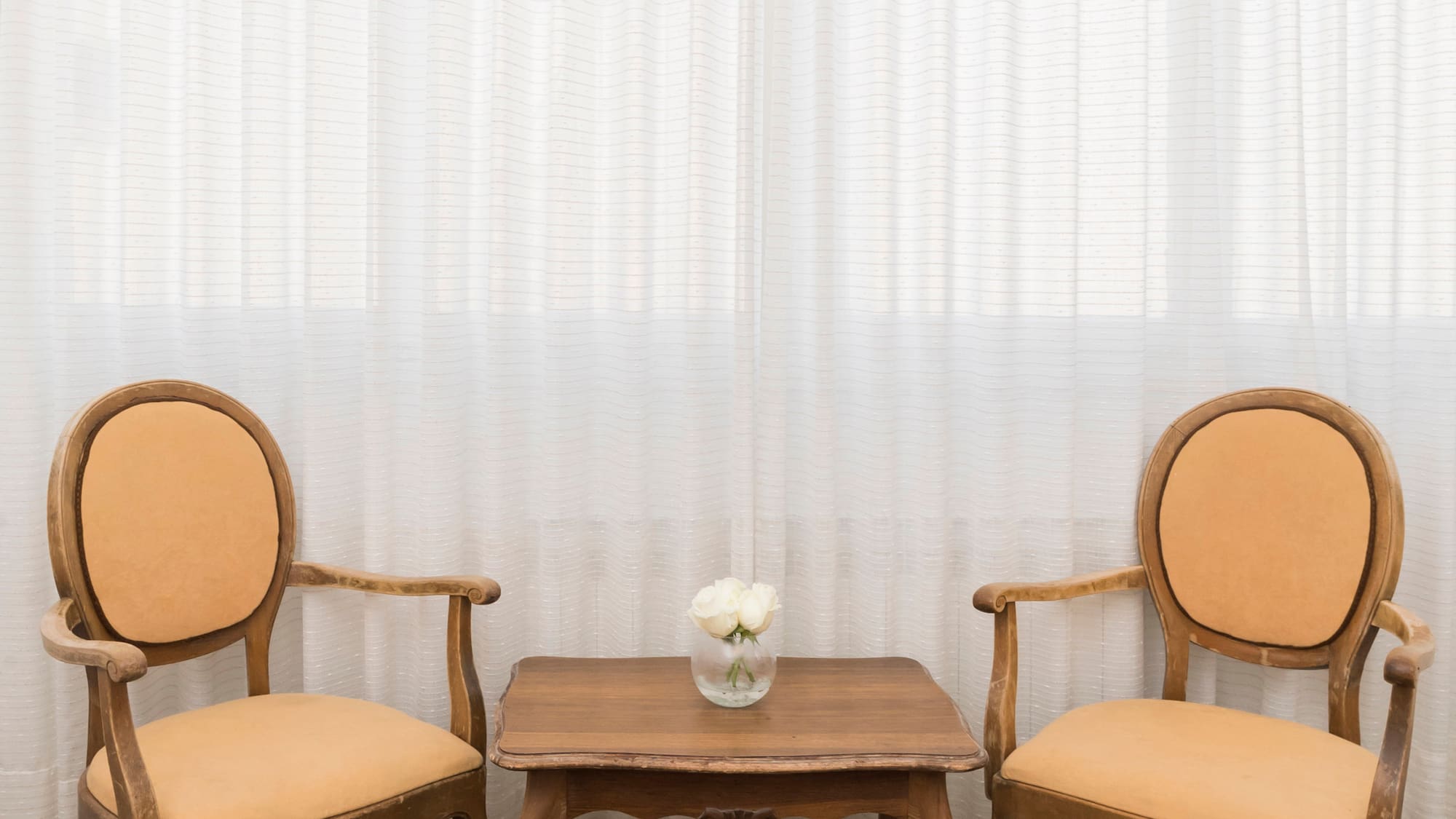 a table and chairs in a room
