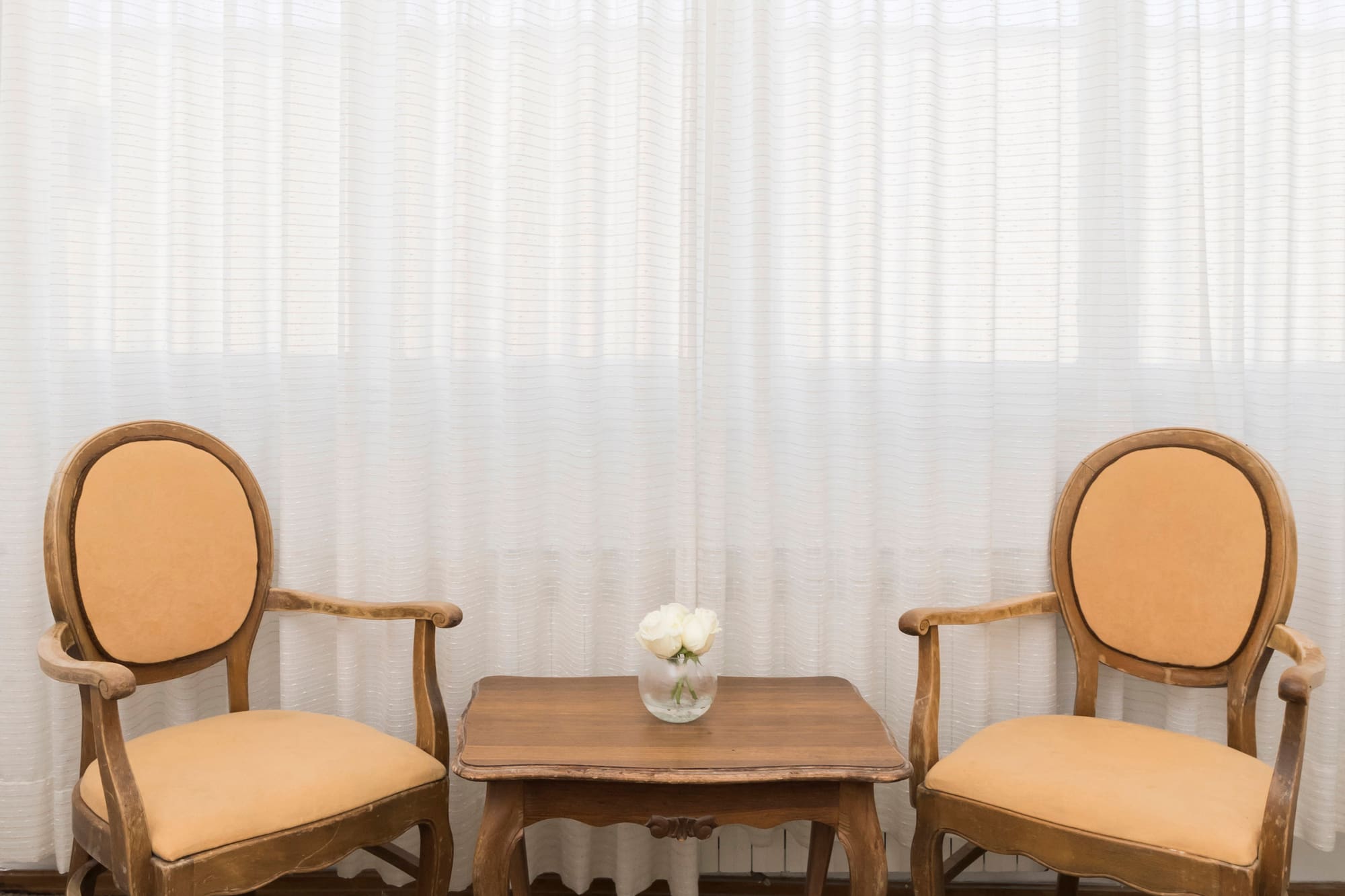 a table and chairs in a room