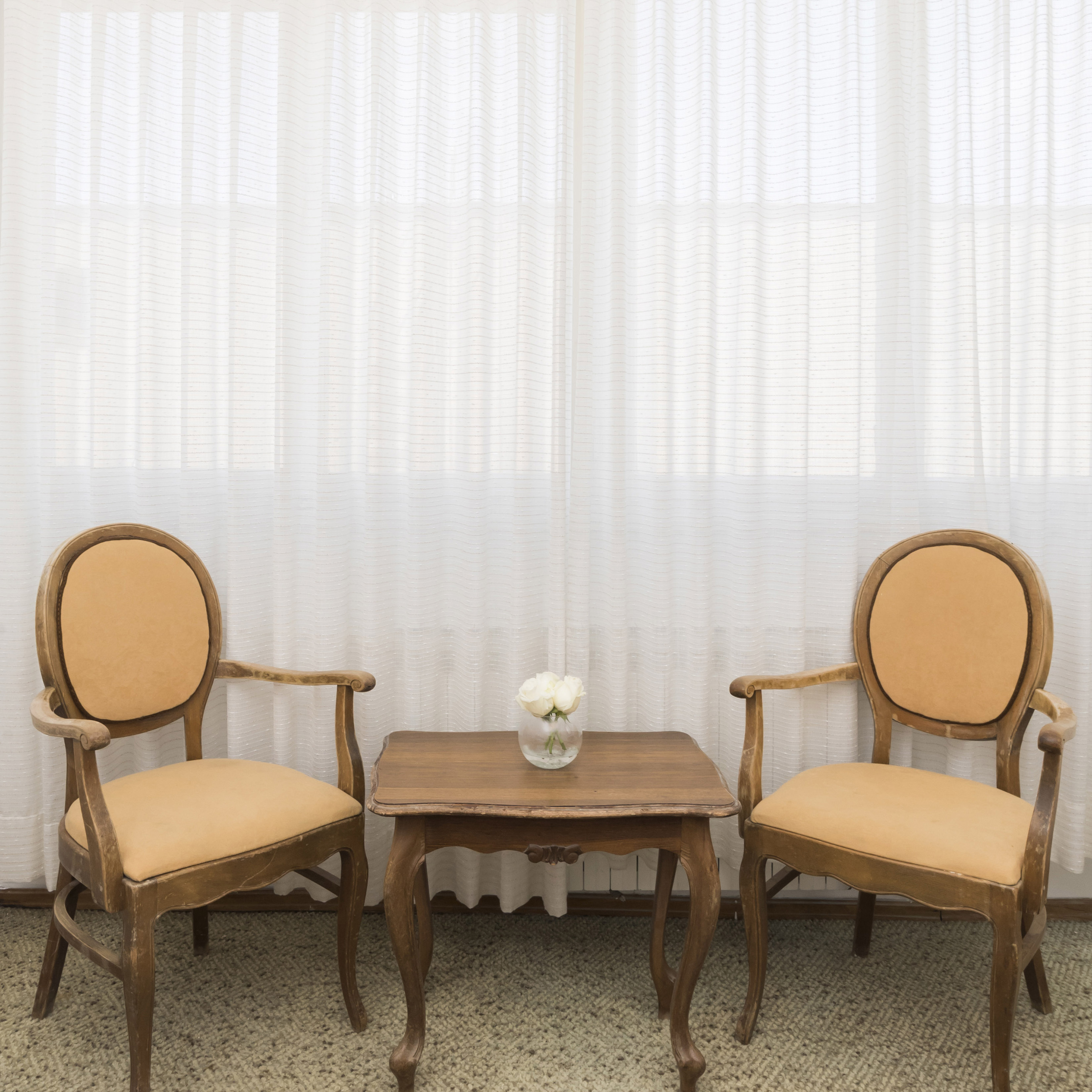 a table and chairs in a room