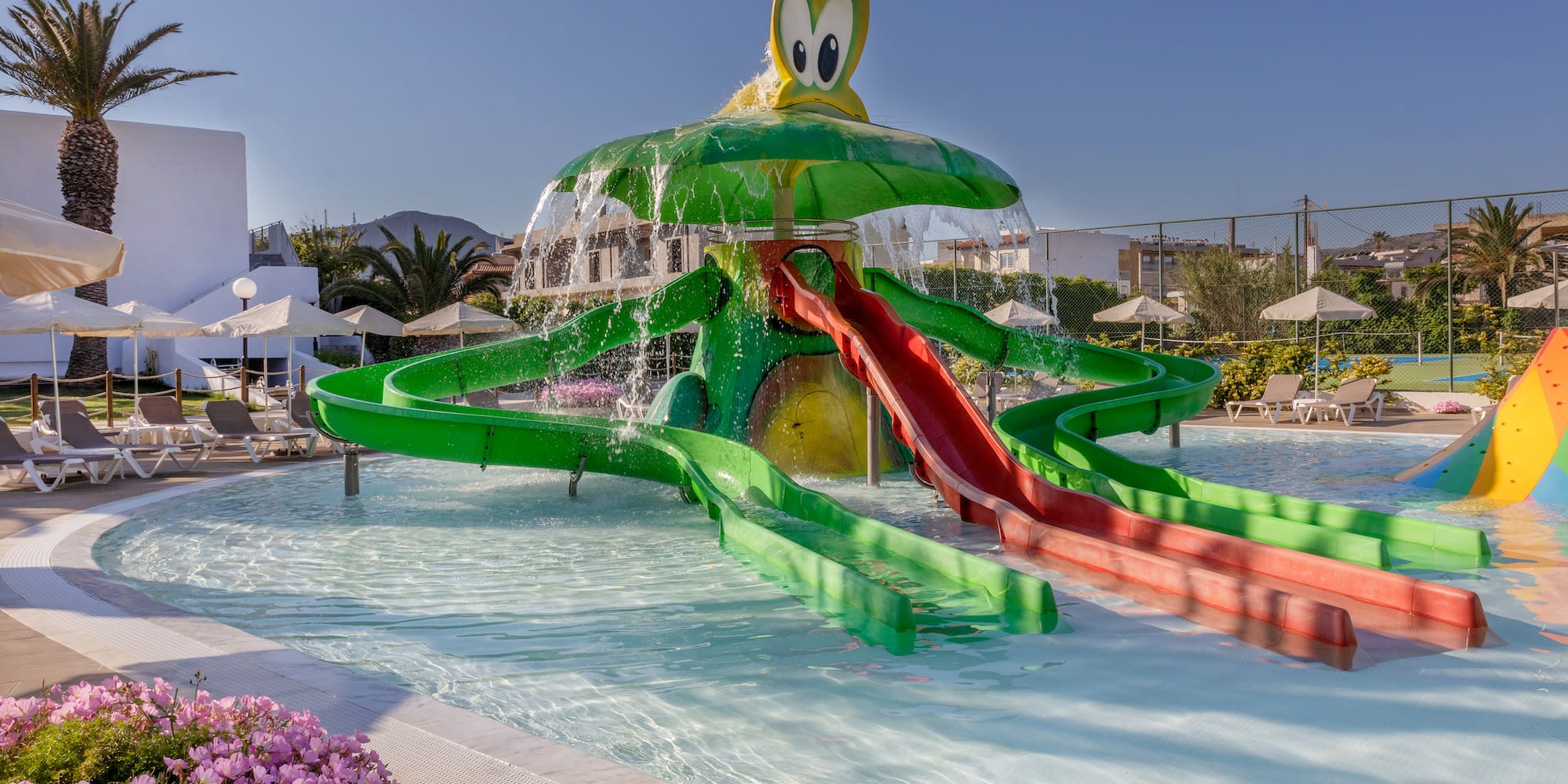 a water slide in a pool